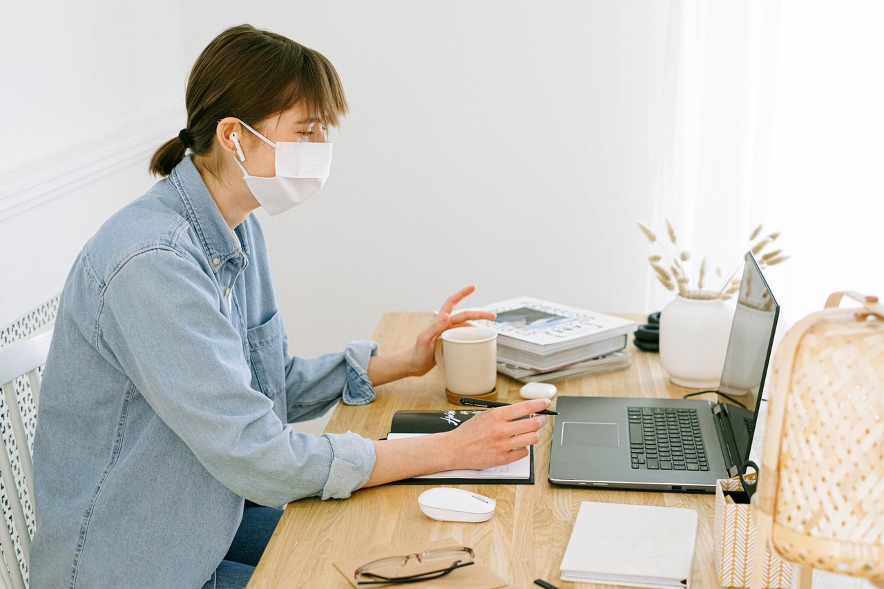 person working with mask