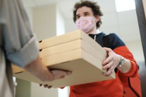 pizza delivery wearing facemask