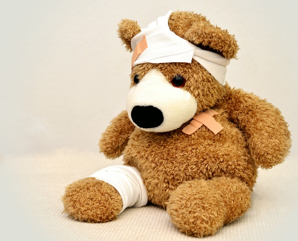 injured toy bear