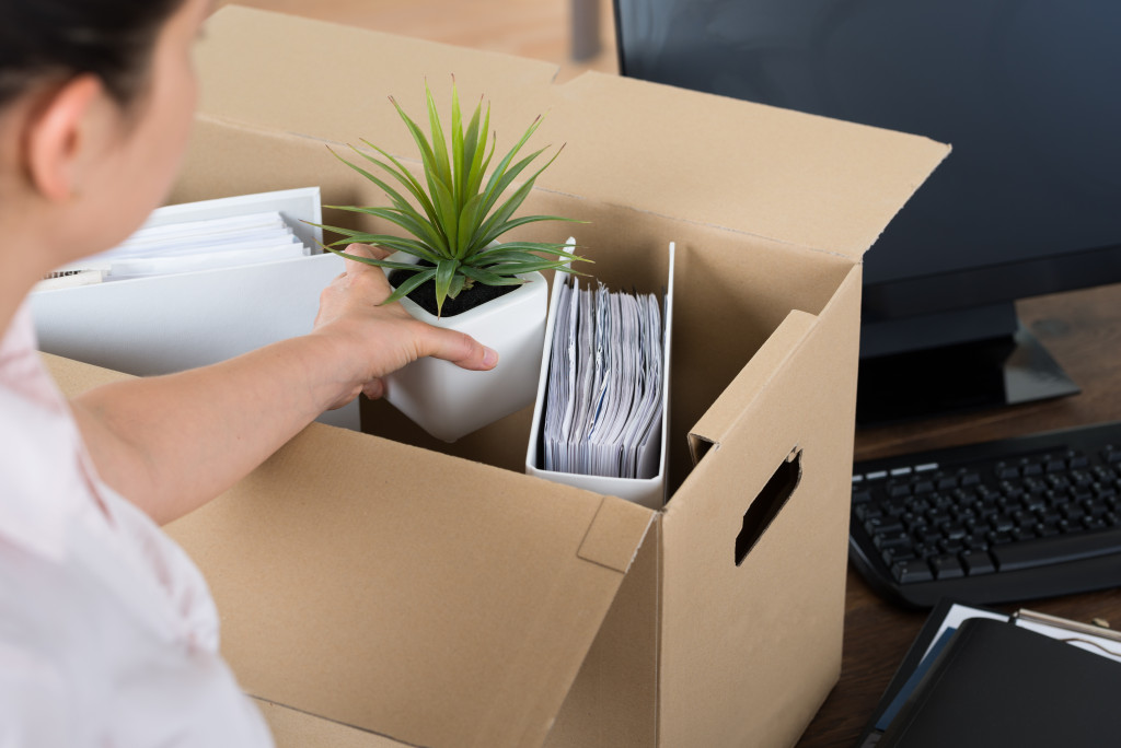 woman packing her things