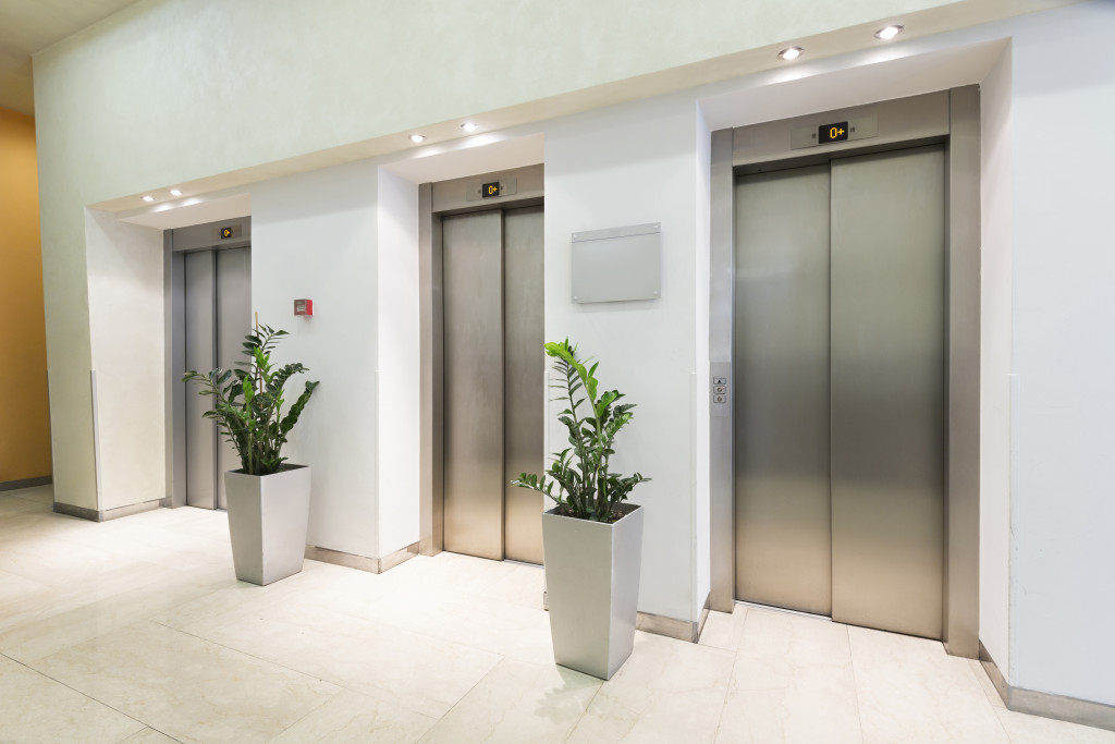 Photo of three elevators in the lobby