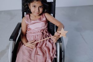 little princess girl on her wheelchair