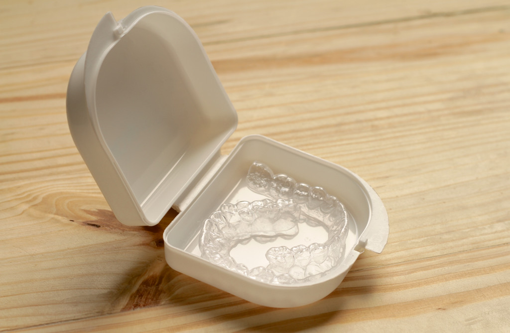 A transparent retainers placed in a case