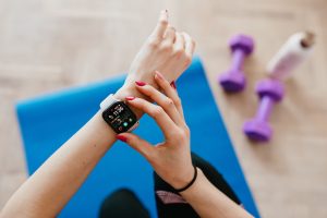 woman checking smart watch