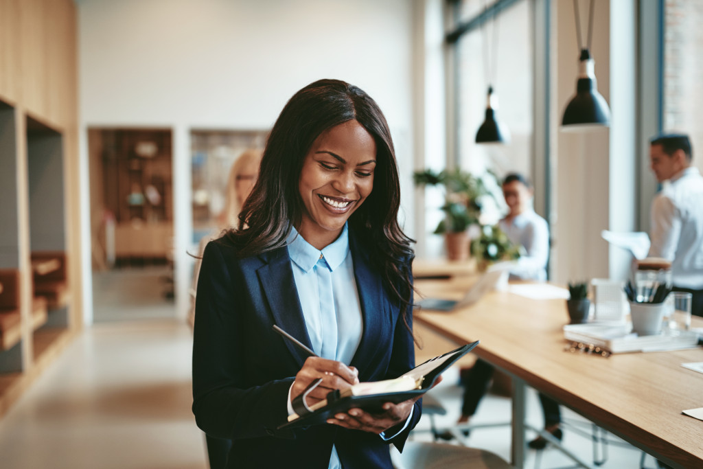 woman walking through a modern office