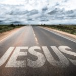 jesus written on rural road